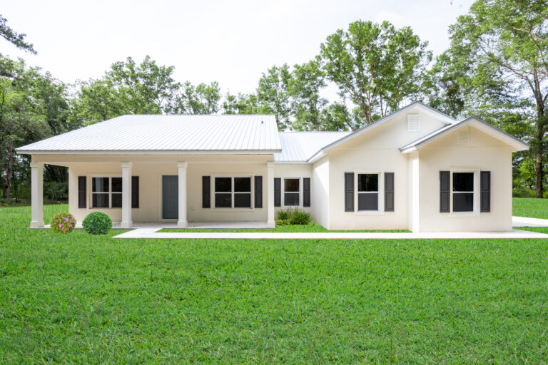 White house built on your lot by red door homes fl